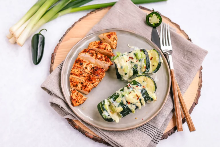 Grilled chicken breast with cheesy Hasselback zucchini
