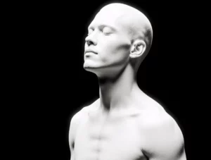 Monochrome portrait of a serene man with eyes closed symbolizing focus and clarity.