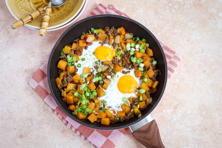 Pumpkin skillet with minced meat and fried eggs.