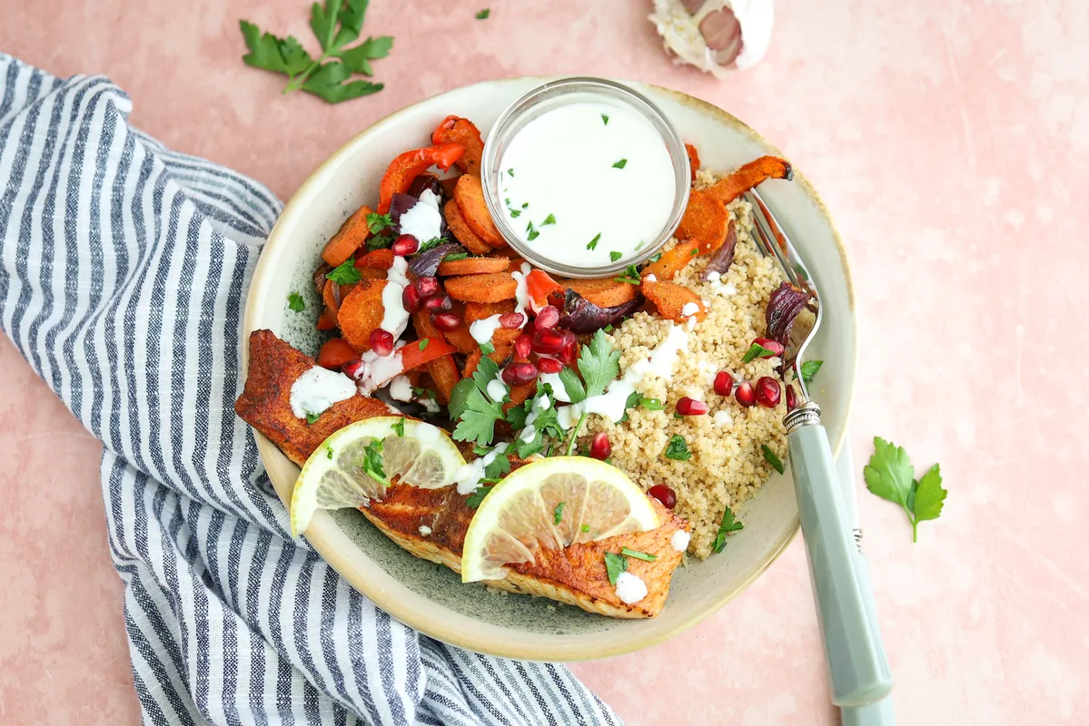 Couscous with roasted vegetables, salmon & feta dressing