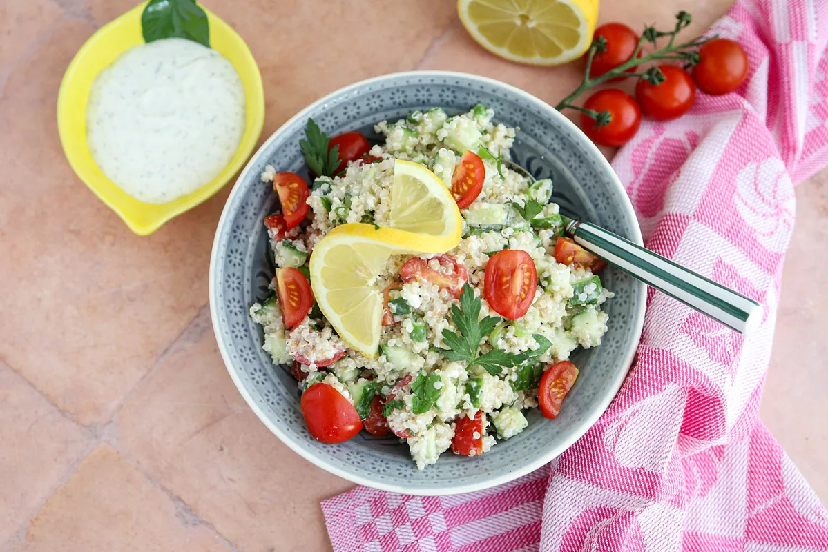 Quinoa with cherry tomatoes & feta dressing