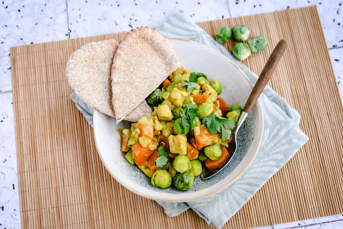 Spicy sweet potato curry with Brussels sprouts & chicken