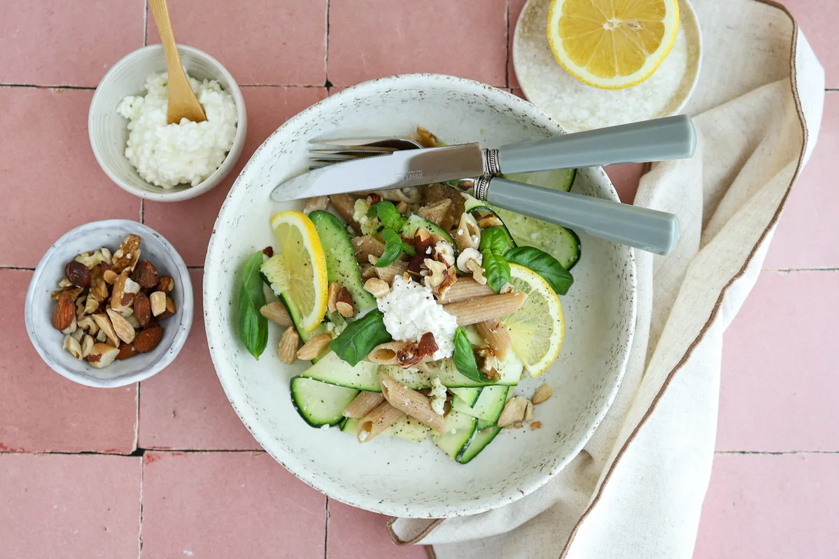 Zucchini penne with lemon, cottage cheese & nuts